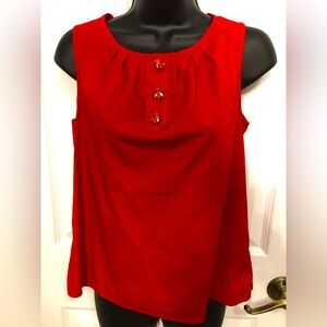 Talbots women’s  size 6P sleeveless blouse.Pleated neckline.Queen Bee buttons